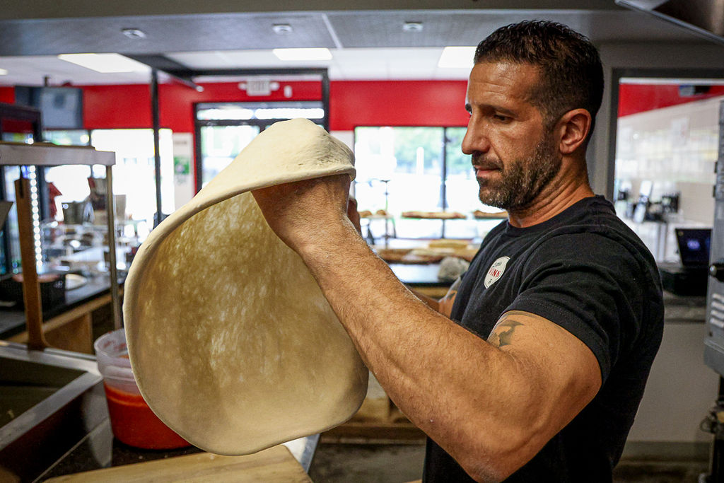 Hand tossed pizza at Vinny's