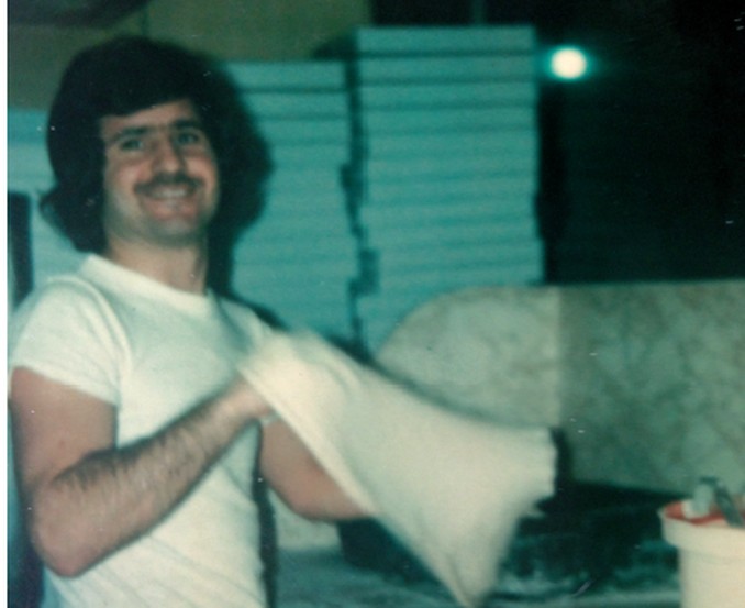 Vinny stretching dough in the early years